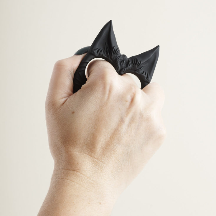 Black Cat Self Defense Keychain in fist