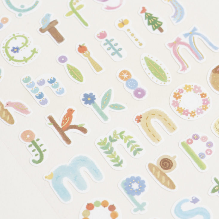 close up of flora and fauna alphabet stickers