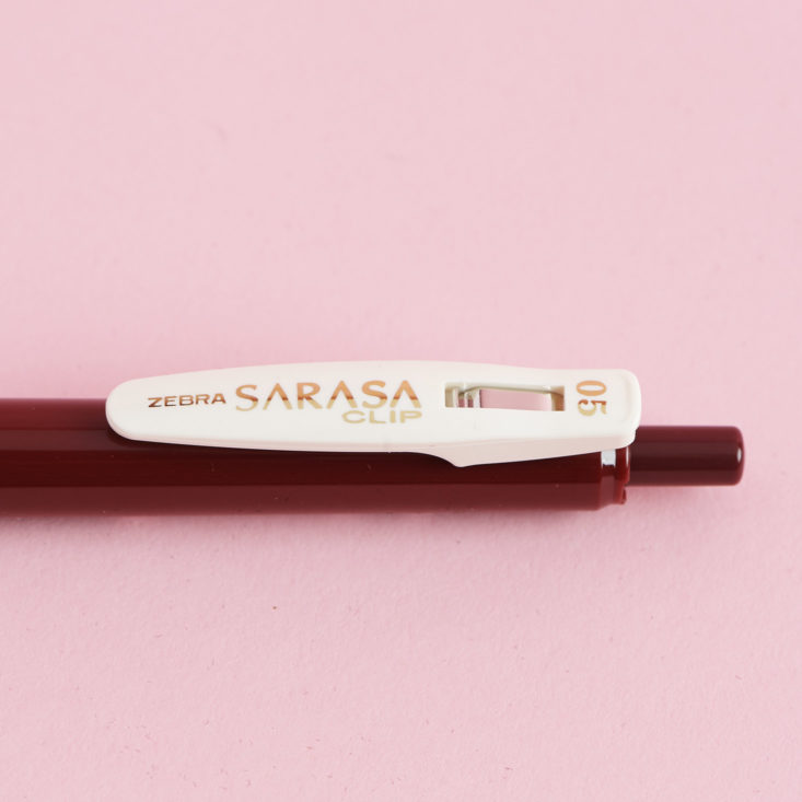 Close up of the clip of a Zebra Sarasa Clip Pen in vintage red