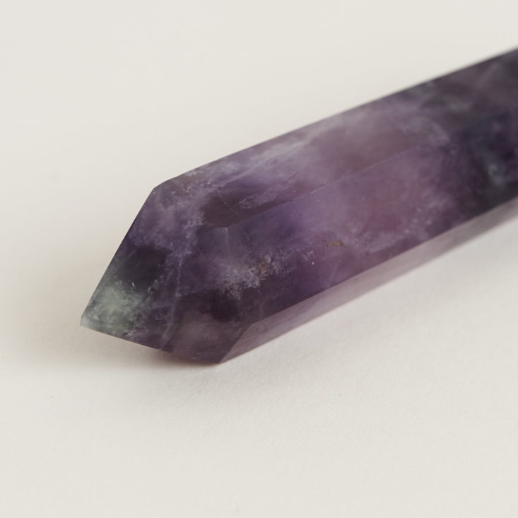 close up of one end of Rainbow Fluorite Wand