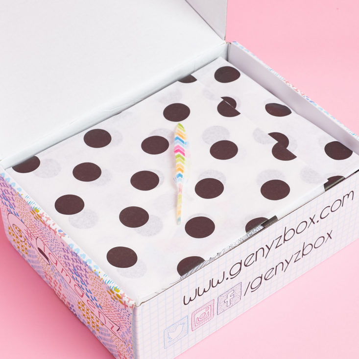 open gen y box with polka dot paper