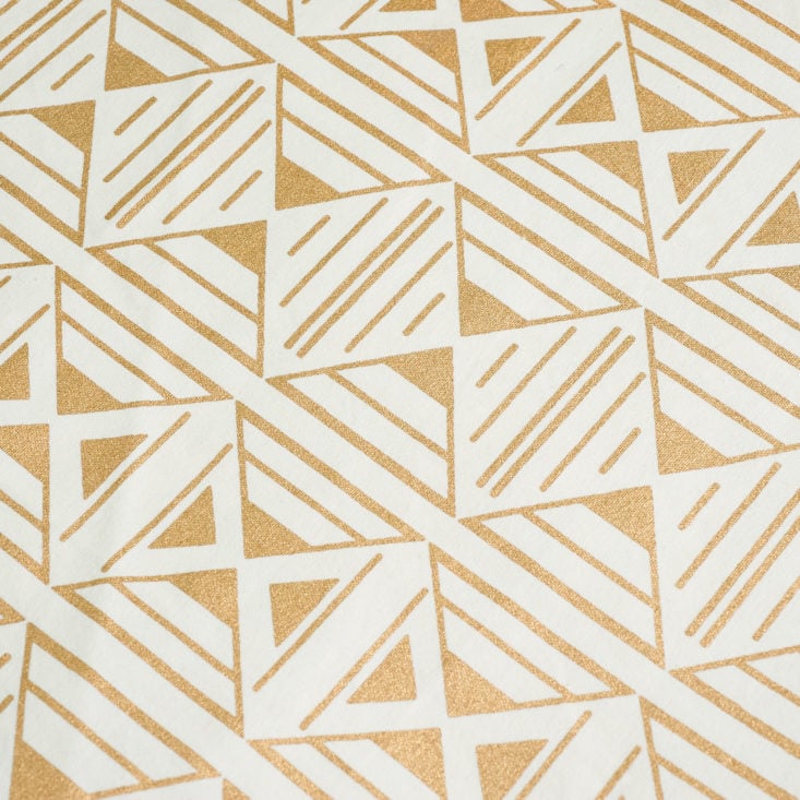 close up of handmade Gold and ivory block print table runner from India