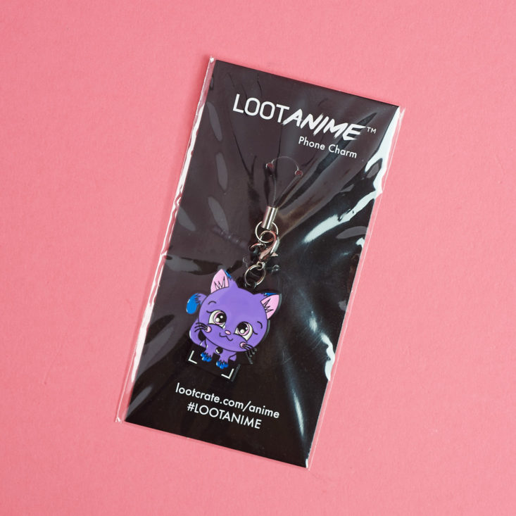 Purple Loot Anime mascot phone charm inside its package