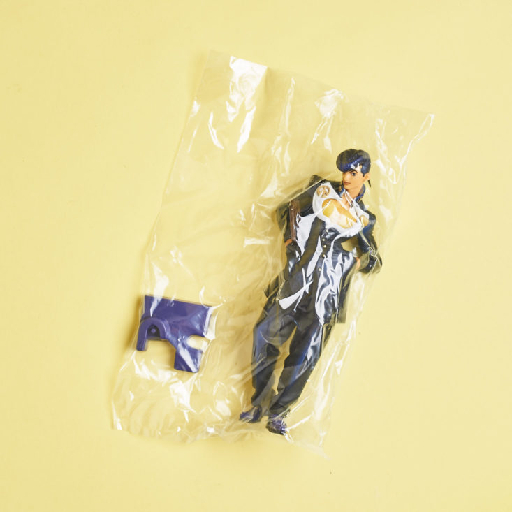 jojo's bizarre adventure character figurine in bag