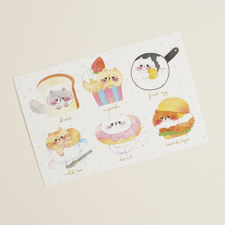 post card featuring cats in food