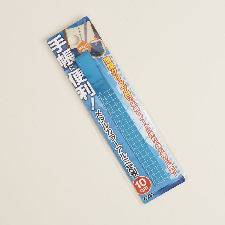 blue clip on ruler in package