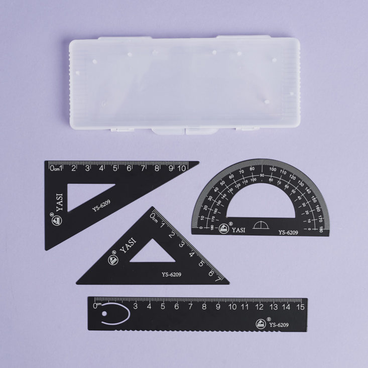 metal ruler set laid out with case
