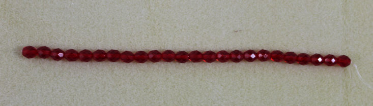 red firepolished beads on a string