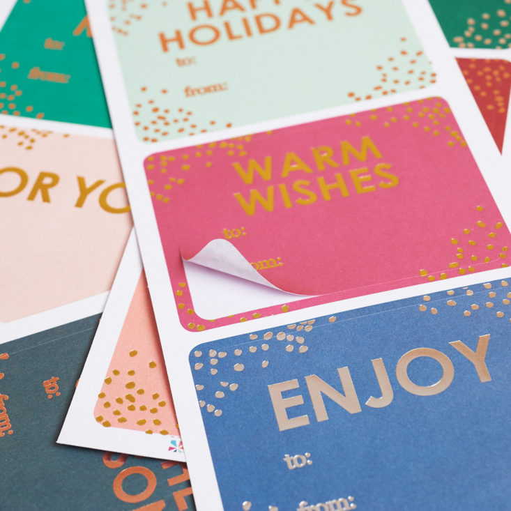 a stack of holiday gift tag stickers