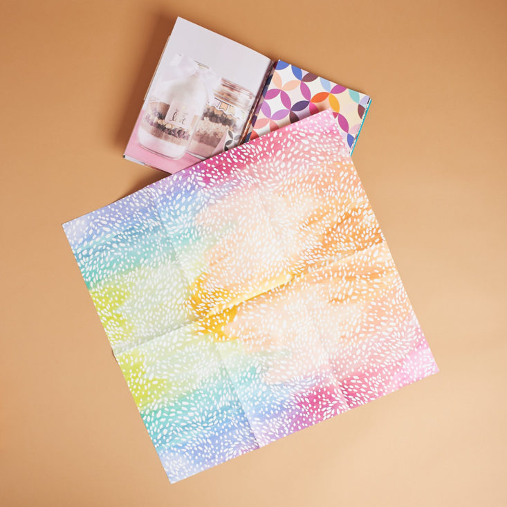 a sheet of rainbow wrapping paper from the erin condren gifting on the go kit