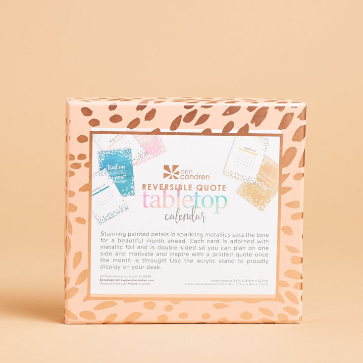 the back of the erin condren tabletop calendar kit package, which is gold and pink with a white section describing the kit