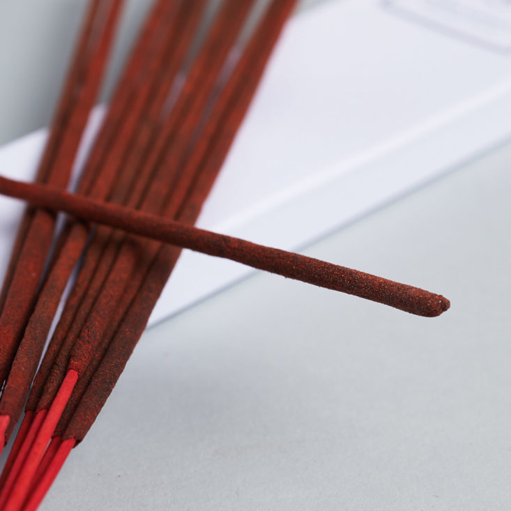 the end of one red incense stick
