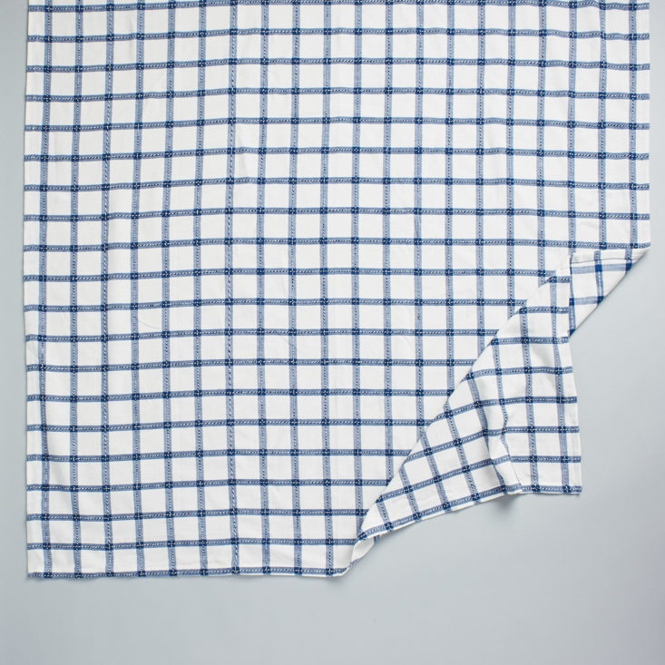 This blue gridded dish towel is lightweight and classic.