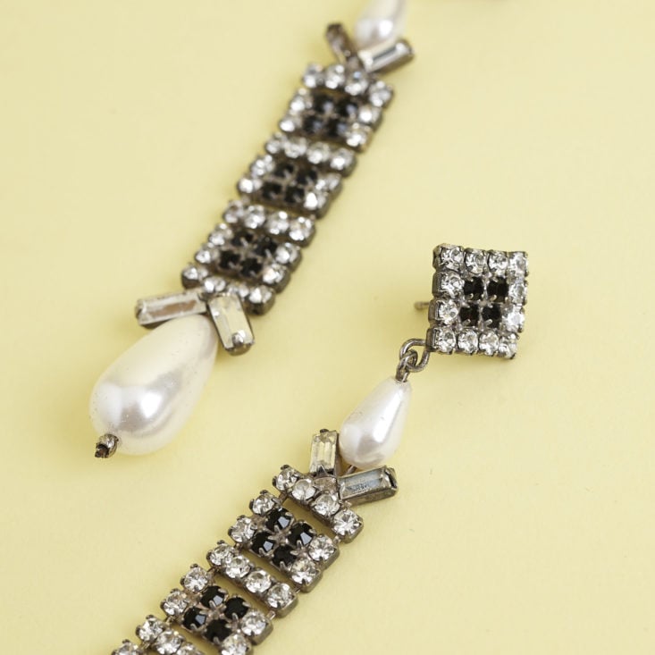 close up of top of 1930s pearl costume jewelry earrings