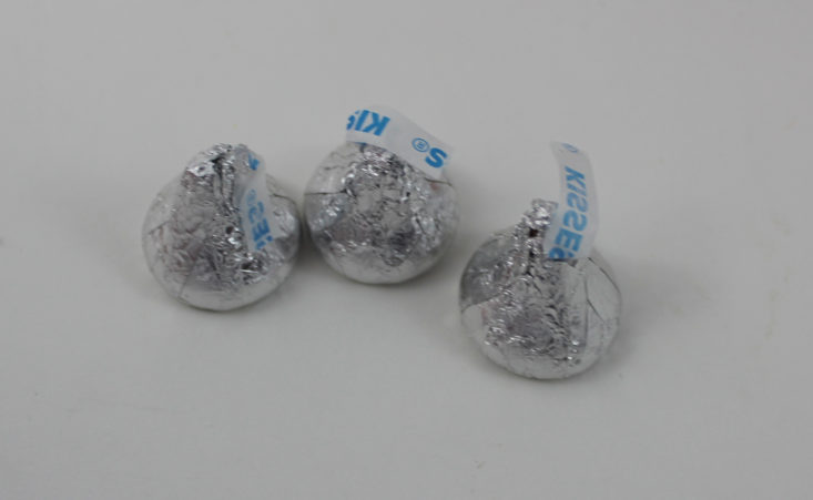 3 silver wrapped Hershey’s Kisses