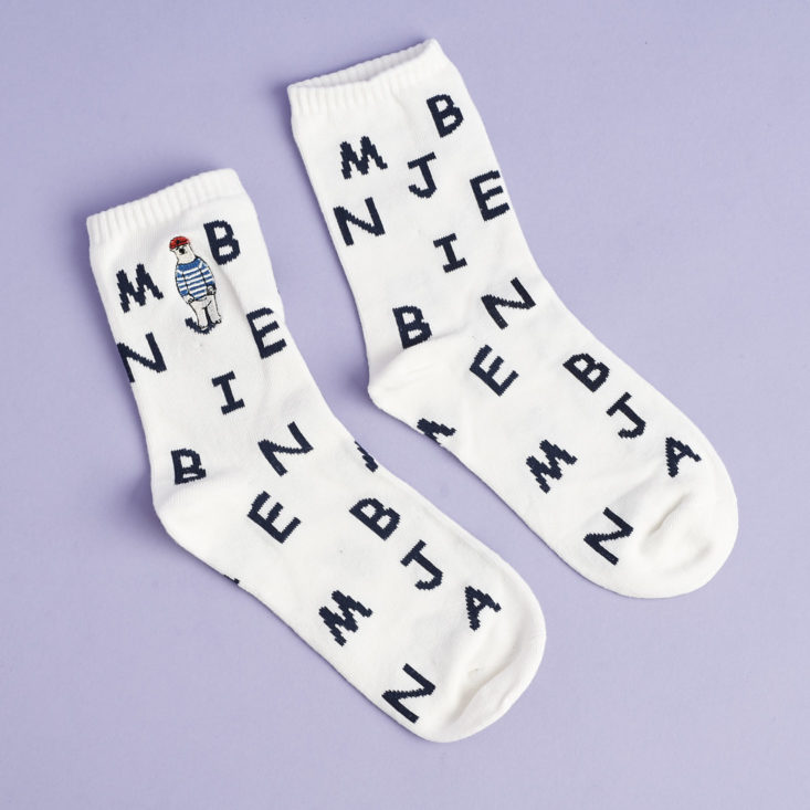 white socks with black letters and steve zissou-style polar bears on the ankles