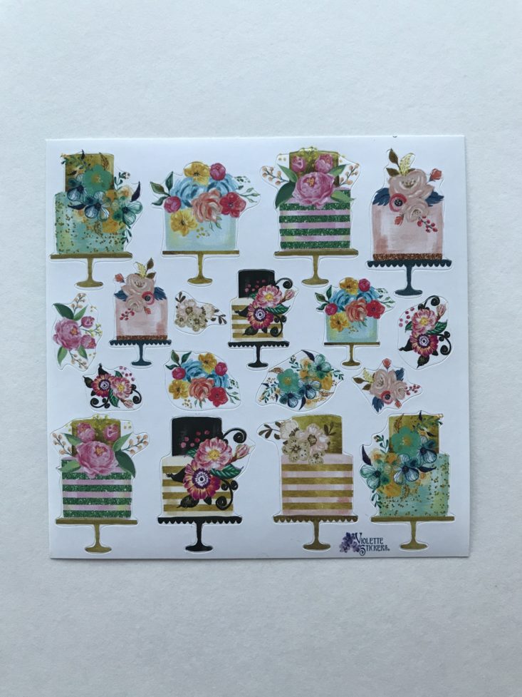 sticker sheet of cake illustrations with flower toppers