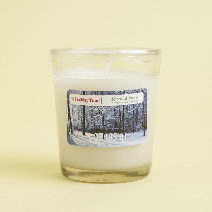 hpliday time candle in moonlit snow