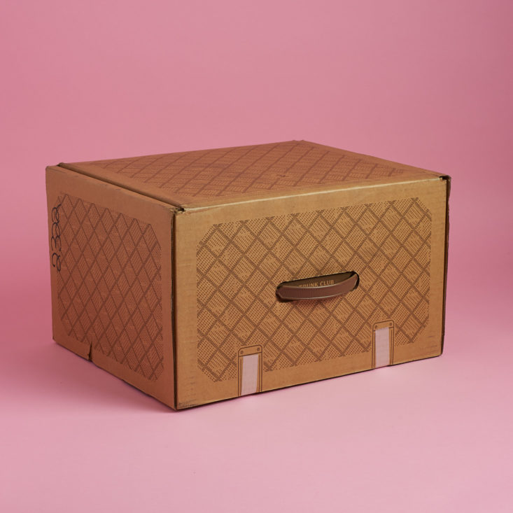 Trunk Club December 2017 box closed and on it's side showing handle