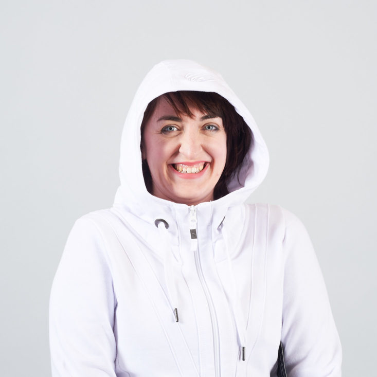 model wearing hood on white fitness hoodie