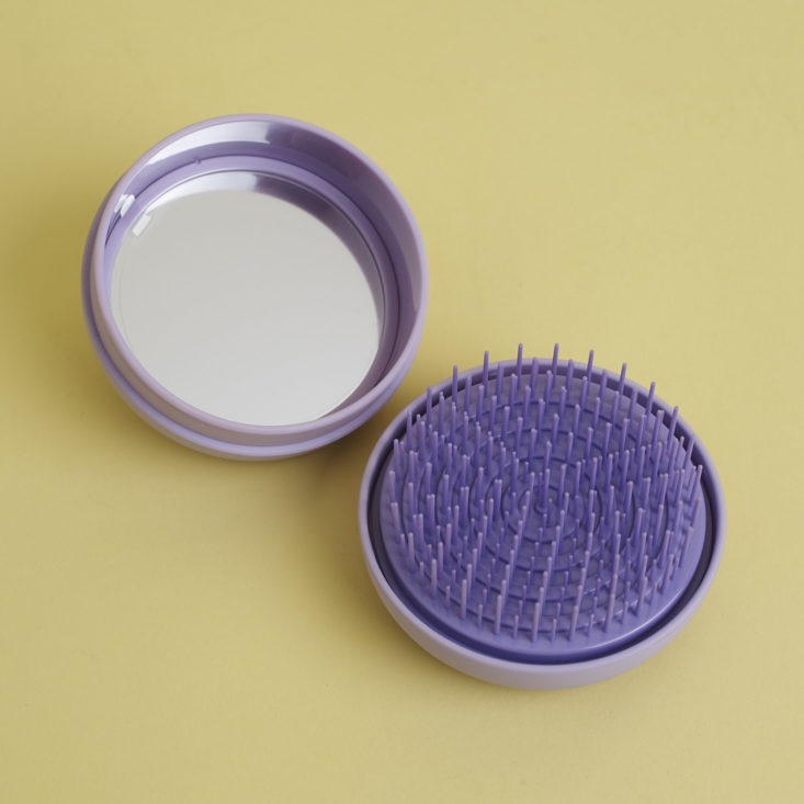 opened Milk and Sass Macaron hair brush compact