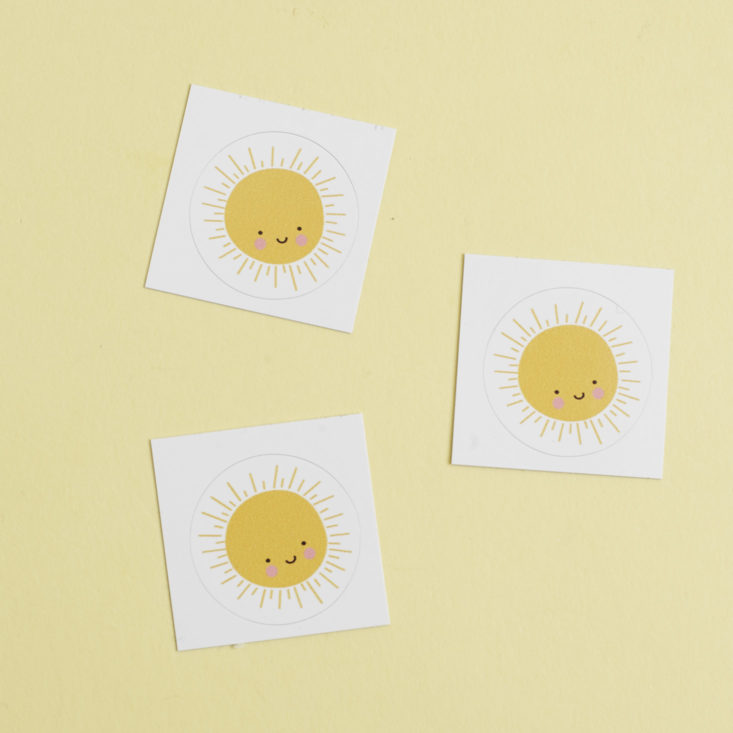 three sunshine stickers