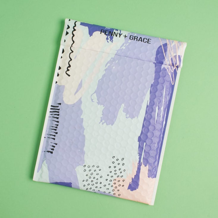 colorful penny and grace shipping envelope