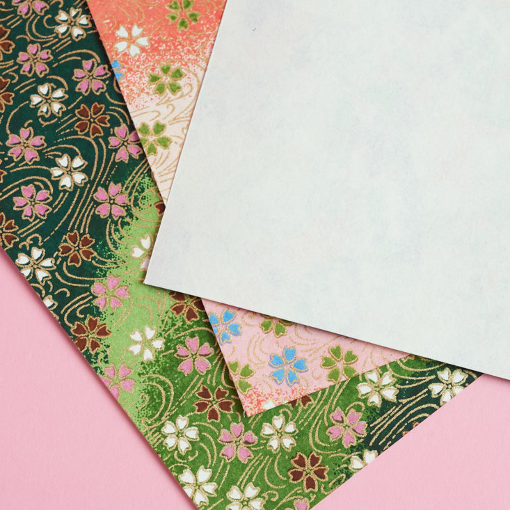 close up of set of three chiyogami washi paper showing blank reverse side