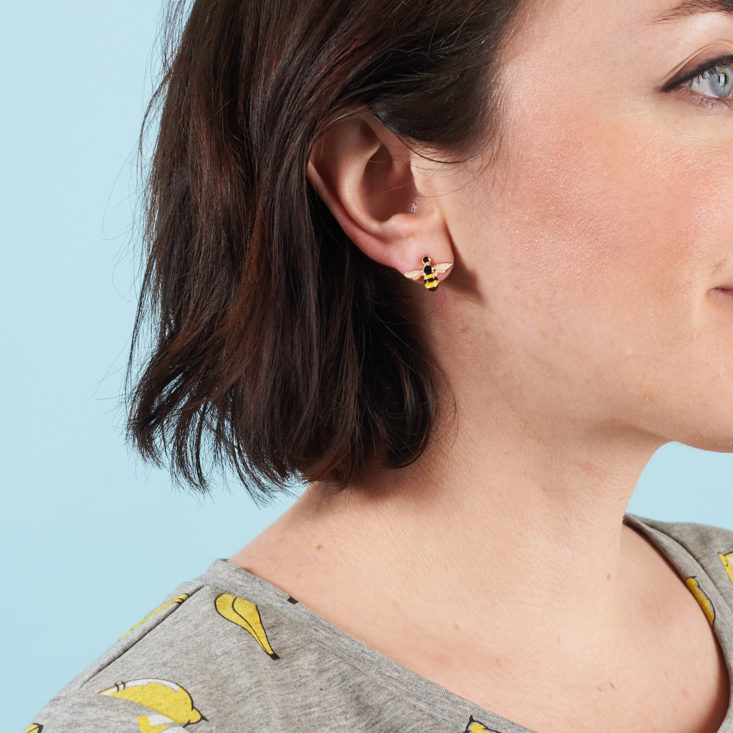 bee earring on model