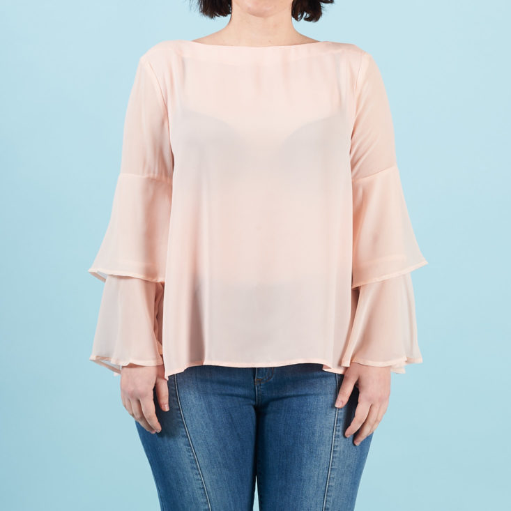 ruffled sheer pink blouse with fluttery sleeves