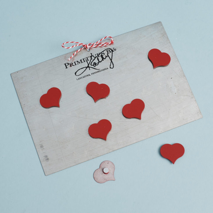 Heart Magnets on metal sign