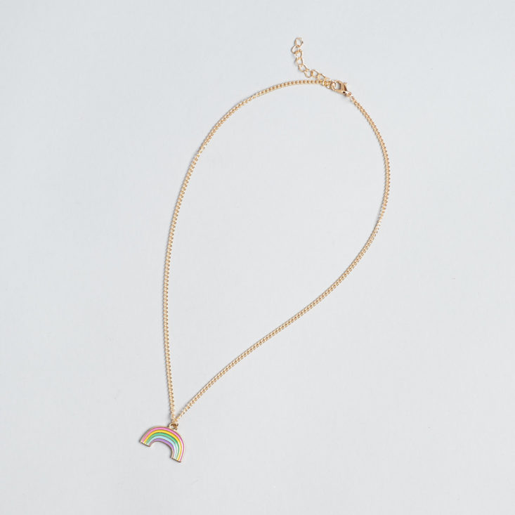 rainbow pendant necklace laid flat