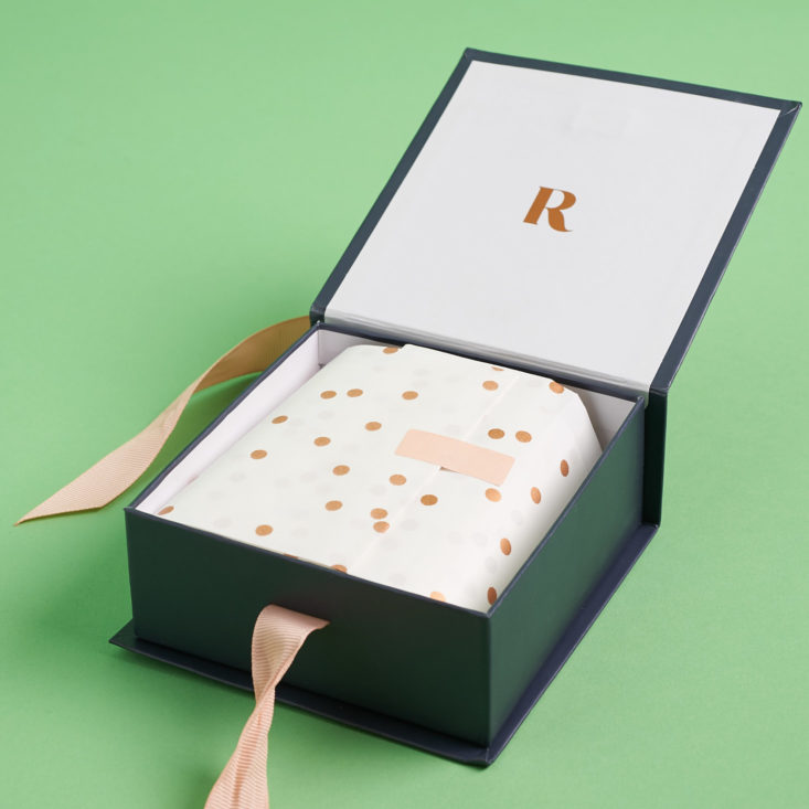 rocksbox jewelry pieces wrapped in paper