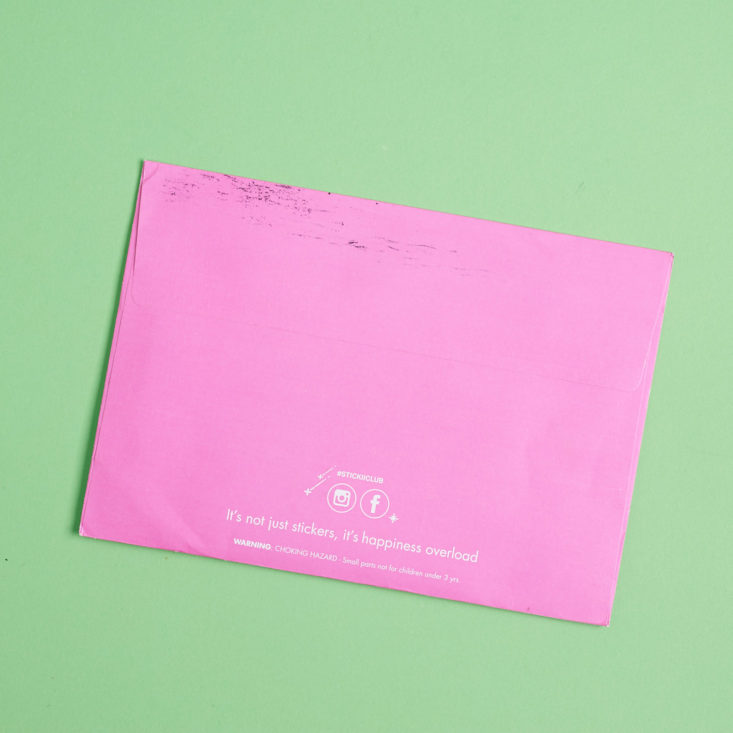 pink back of stickii club envelope