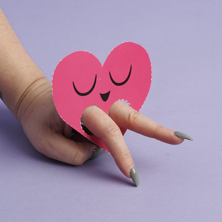 Heart cutout with fingers