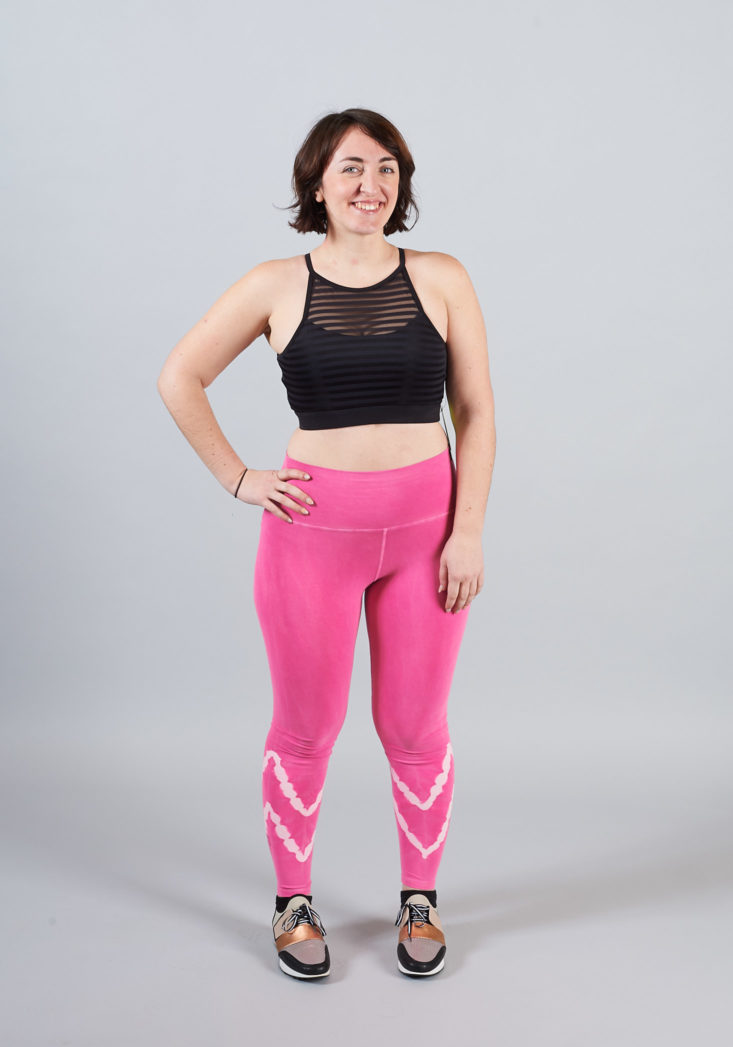 pink leggings and black top