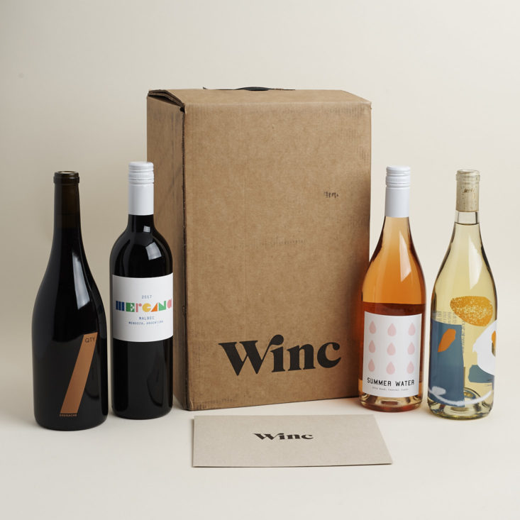 4 bottles of wine with winc box