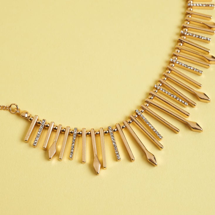 detail of gold necklace