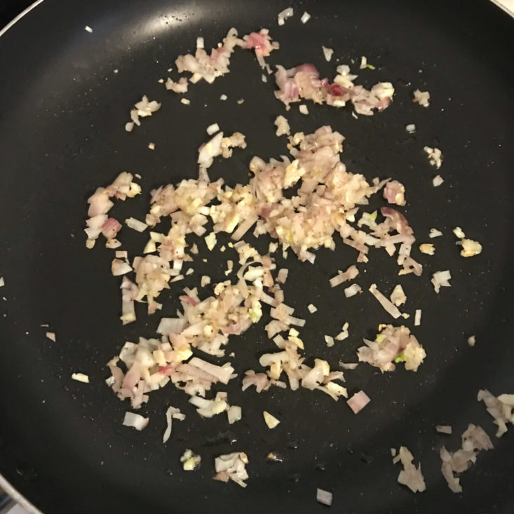 garlic and shallot cooking in pan