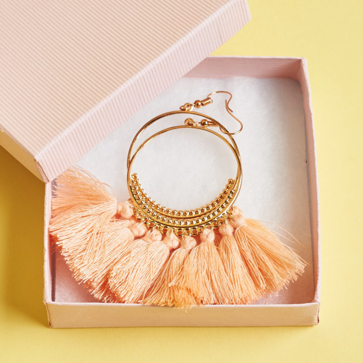 earrings with pink fringe in box