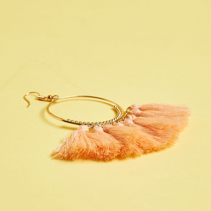 pink fringe on gold earrings