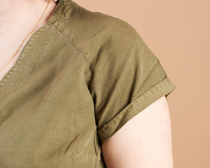 cuffed sleeve on olive jumpsuit