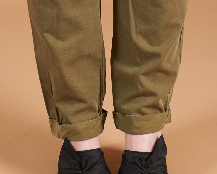 cuffed ankles on olive jumpsuit