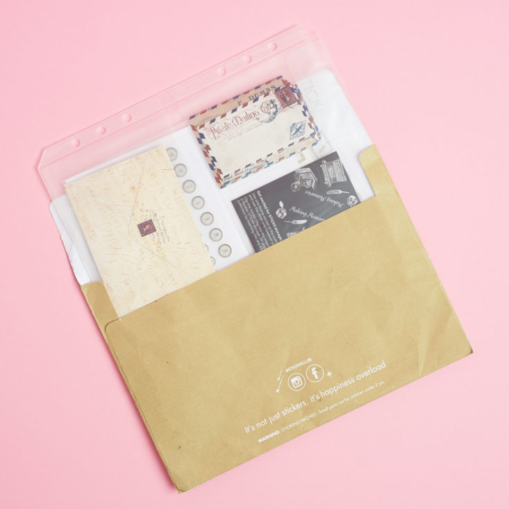 gold envelope full of stickii stickers