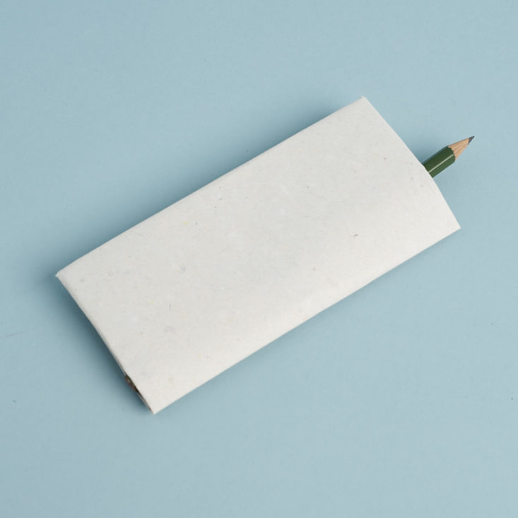 pencil peeking out of paper