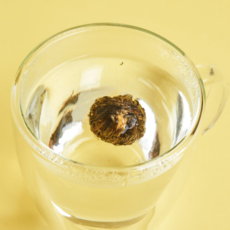 tea blooming in mug