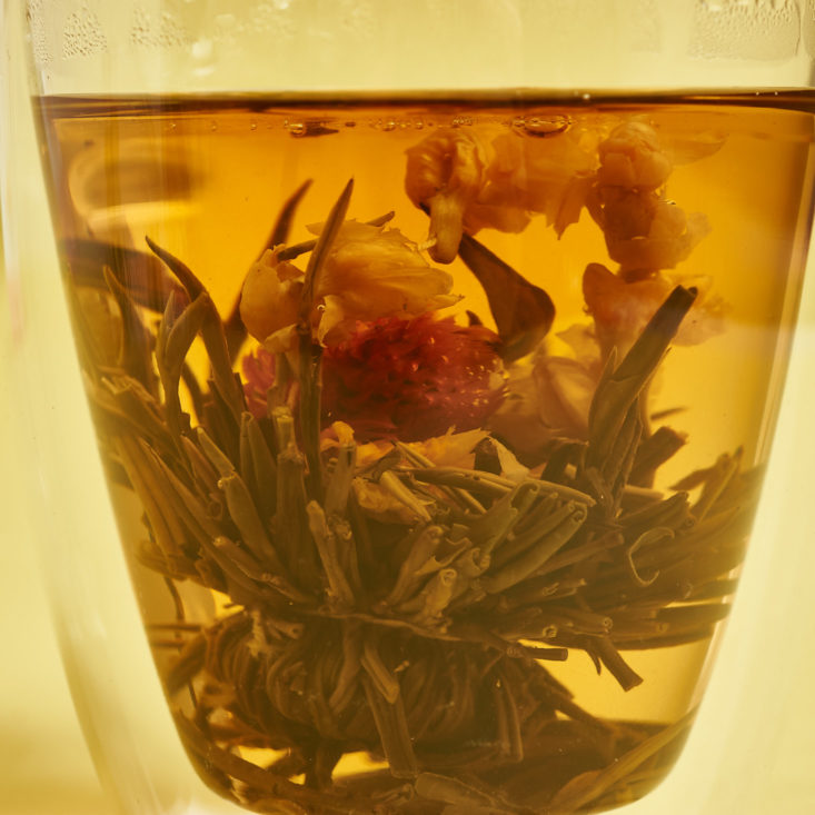 fully bloomed tea in mug