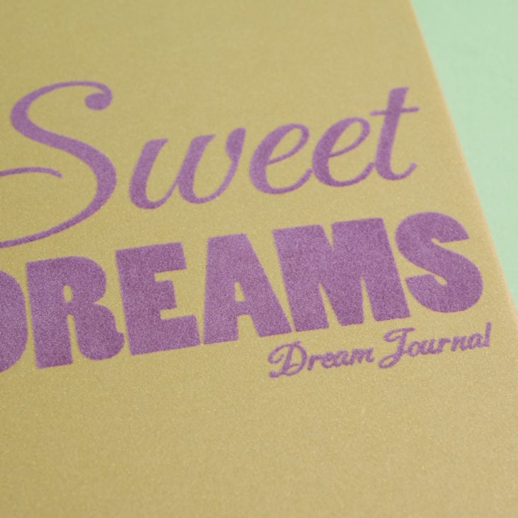 close up of fuzzy lettering on journal