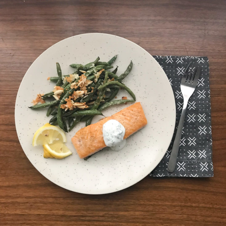 finished Salmon with Dill Crema and green beans amandine
