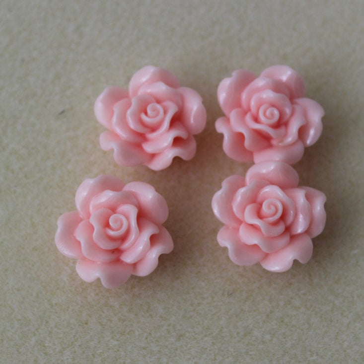 Four pink Resin Flowers